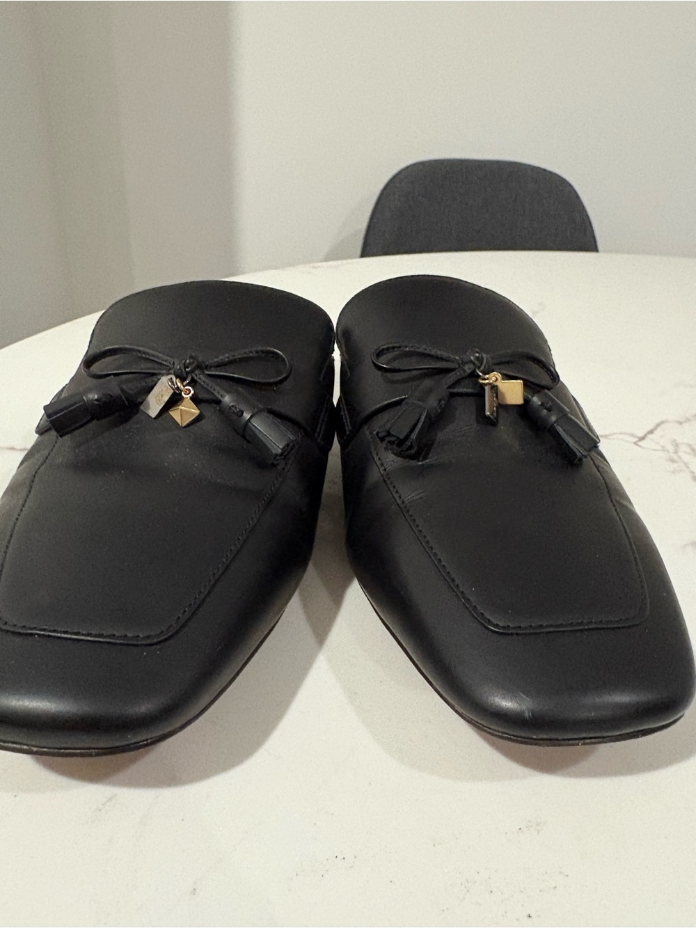 Coach Black Genuine Leather Tassel Backless Loafers; as is